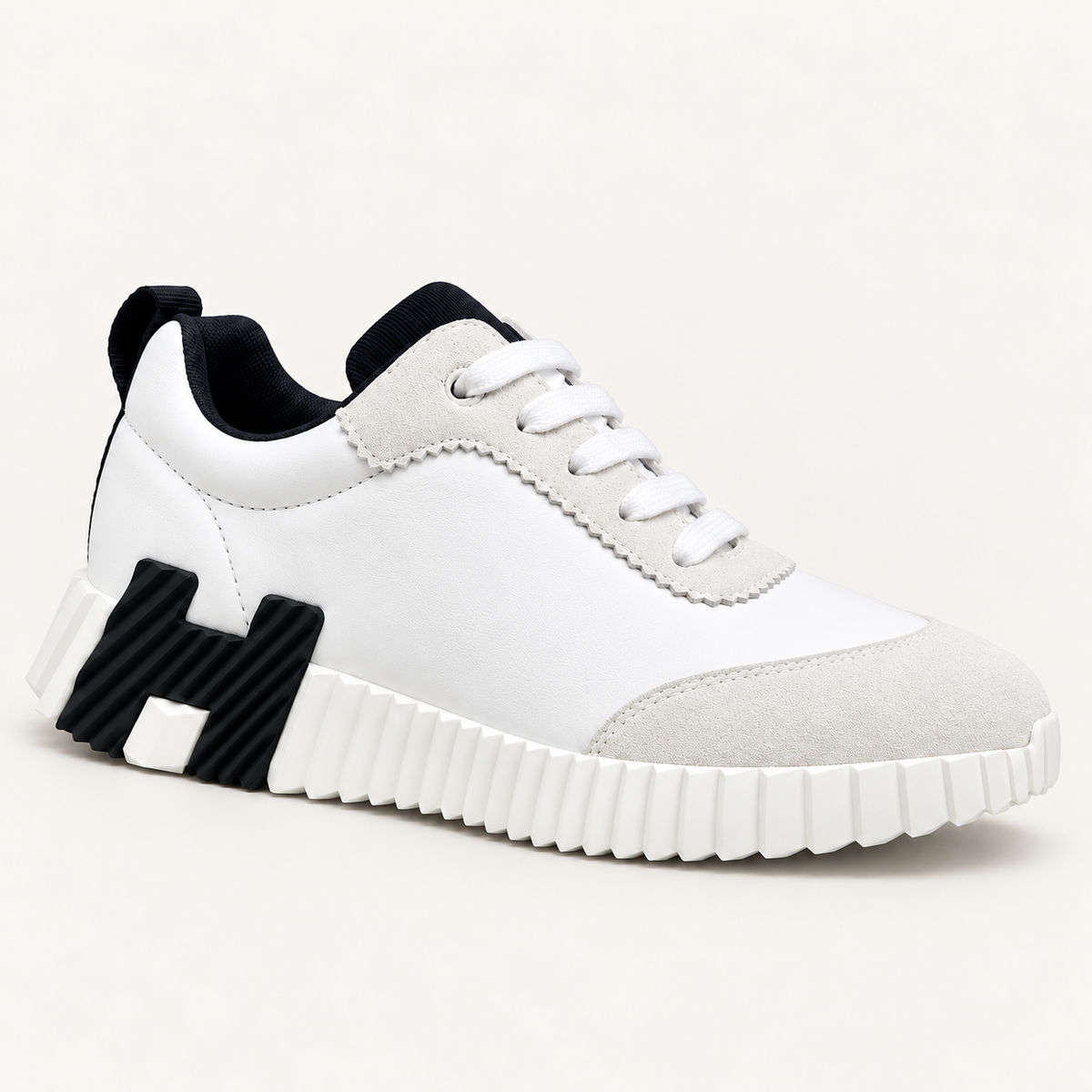 Hermès Bouncing Blanc / Noir — côté