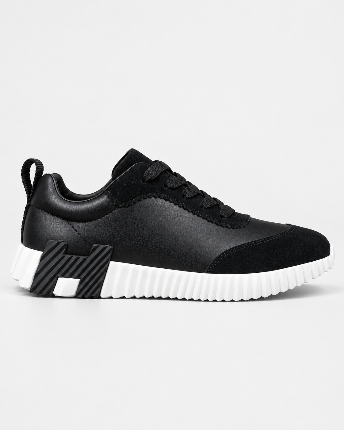 Hermès Bouncing Noir / Blanc — côté extérieur