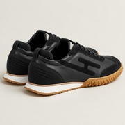 [color:Noir / Écru] Hermès Jet Noir / Écru — 3/4 arrière