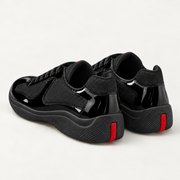 [color:Noir intégral] Prada — Sneakers America’s Cup | 3/4 arrière / talon