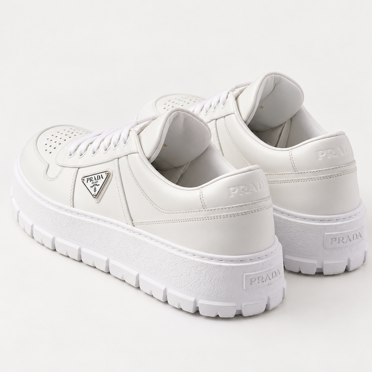 [color:Blanc intégral] Prada — Sneakers à semelle épaisse | 3/4 arrière