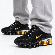 [color:Noir-or] Nike Shox TL | Porté